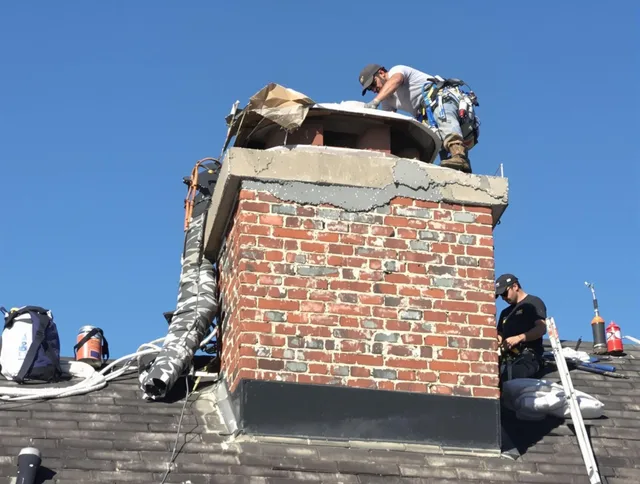 Macedonia Chimney Sweep installing a custom chimney crown in Macedonia, OH