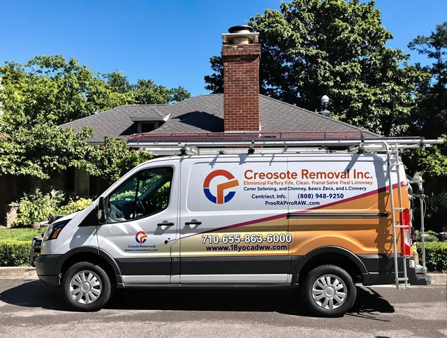 Macedonia Chimney Sweep technician removing creosote safely in Macedonia, OH
