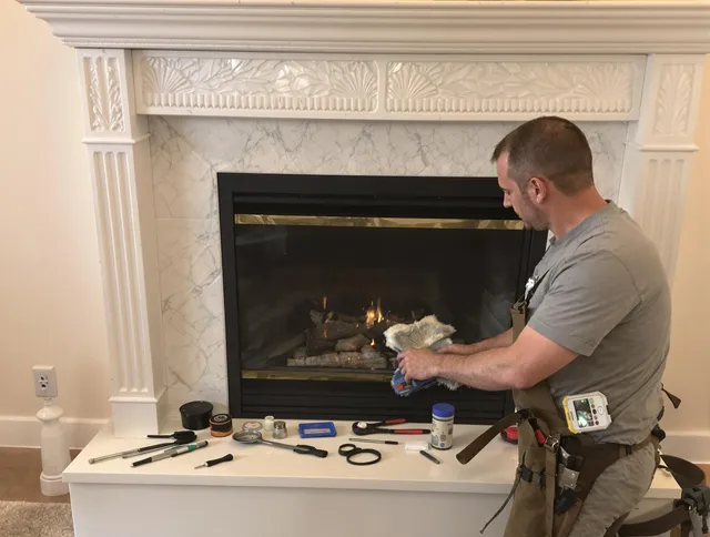 Macedonia Chimney Sweep performing fireplace maintenance in Macedonia, OH