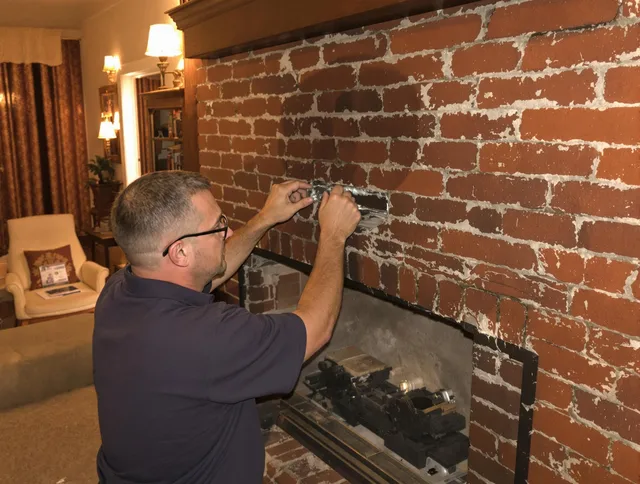 Macedonia Chimney Sweep expert fixing a fireplace in Macedonia, OH